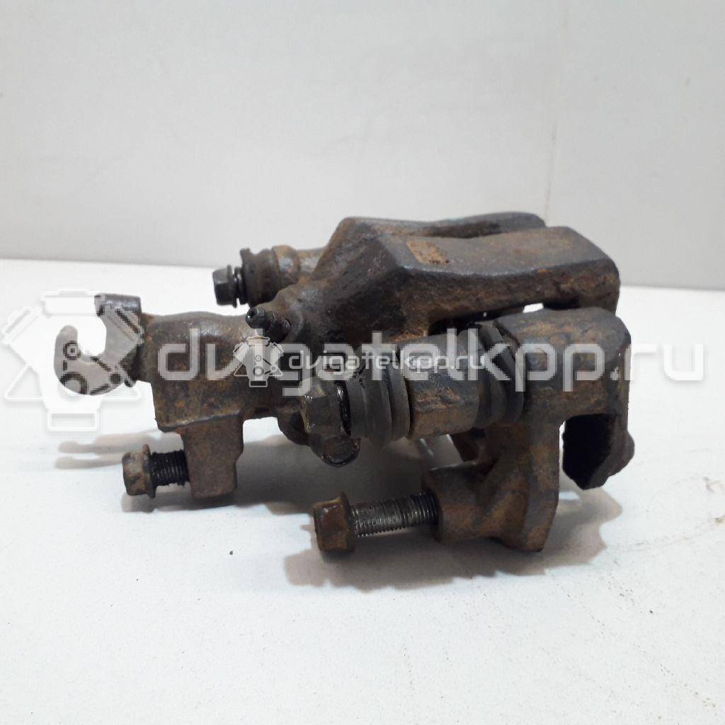 Фото Суппорт тормозной задний левый  0K2N349990 для Kia Shuma Fb / Carens / Sephia Fa / Clarus {forloop.counter}}