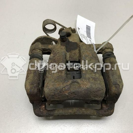 Фото Суппорт тормозной задний левый  583101RA30 для kia RIO