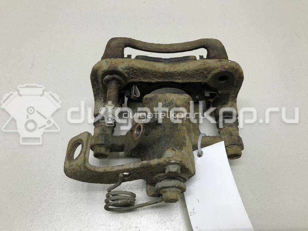 Фото Суппорт тормозной задний левый  583101RA30 для kia RIO {forloop.counter}}