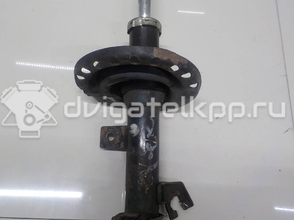 Фото Амортизатор передний правый  543029u025 для Nissan Note / Micra {forloop.counter}}