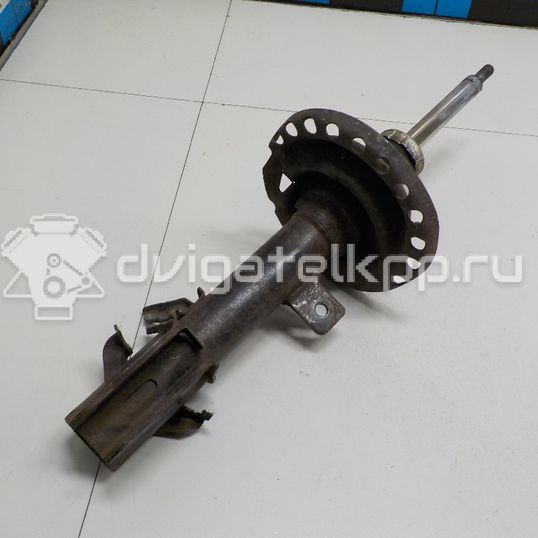 Фото Амортизатор передний левый  543039U025 для Nissan Note / Micra