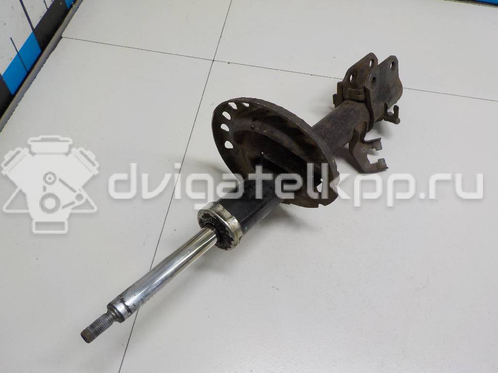 Фото Амортизатор передний левый  543039U025 для Nissan Note / Micra {forloop.counter}}