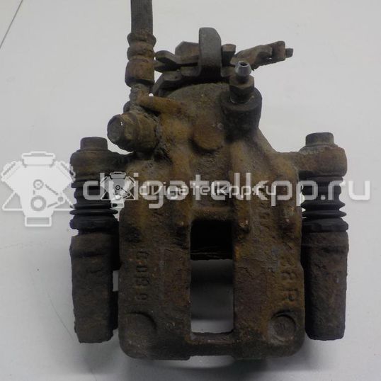 Фото Суппорт тормозной задний правый  44001BM40A для Nissan Primera / Almera
