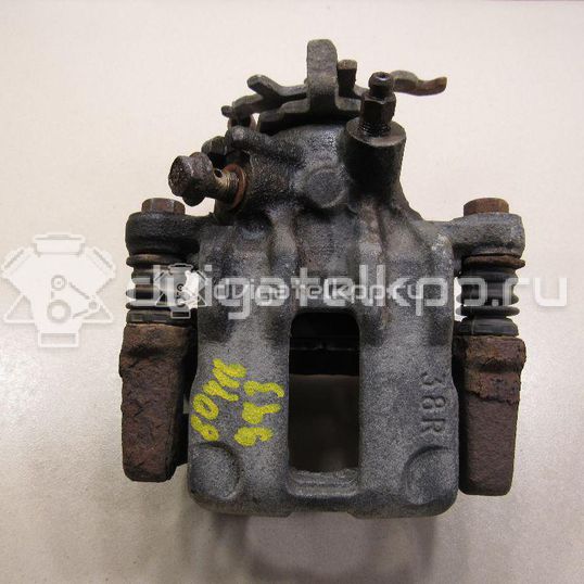 Фото Суппорт тормозной задний правый  44001BM40A для Nissan Primera / Almera