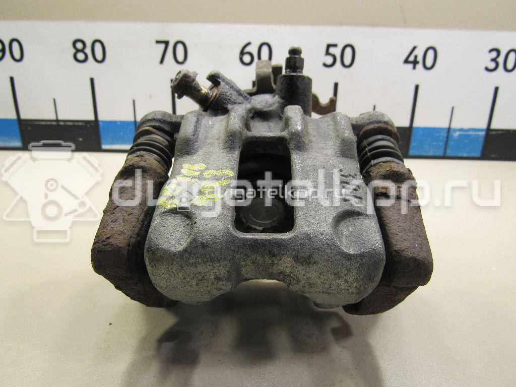 Фото Суппорт тормозной задний правый  44001BM40A для Nissan Primera / Almera {forloop.counter}}
