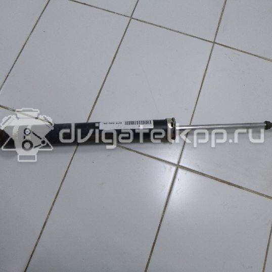 Фото Амортизатор задний  E6210EC80A для Nissan Tiida