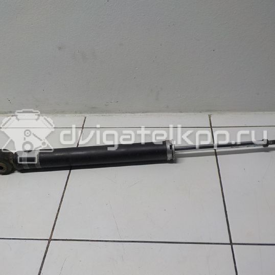 Фото Амортизатор задний  e6210ec80a для Nissan Tiida