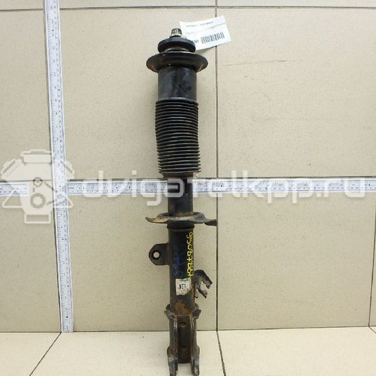 Фото Амортизатор передний правый  e43023vu0b для Nissan Note / Micra