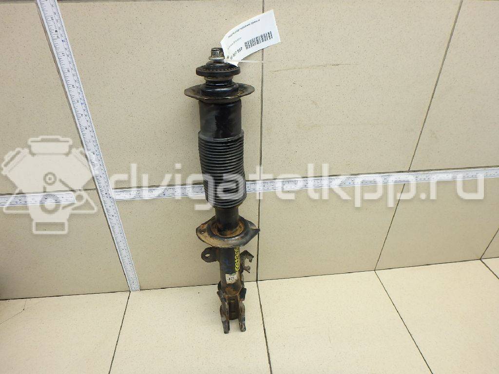 Фото Амортизатор передний правый  e43023vu0b для Nissan Note / Micra {forloop.counter}}