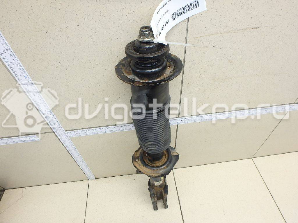 Фото Амортизатор передний правый  e43023vu0b для Nissan Note / Micra {forloop.counter}}