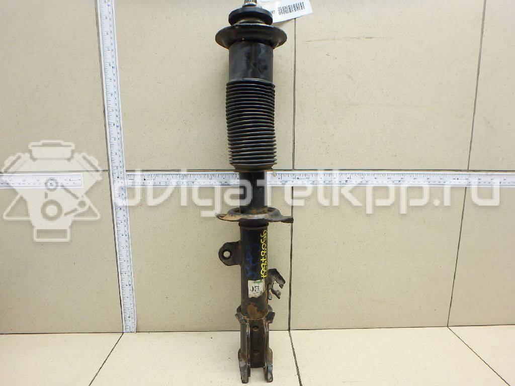 Фото Амортизатор передний правый  e43023vu0b для Nissan Note / Micra {forloop.counter}}