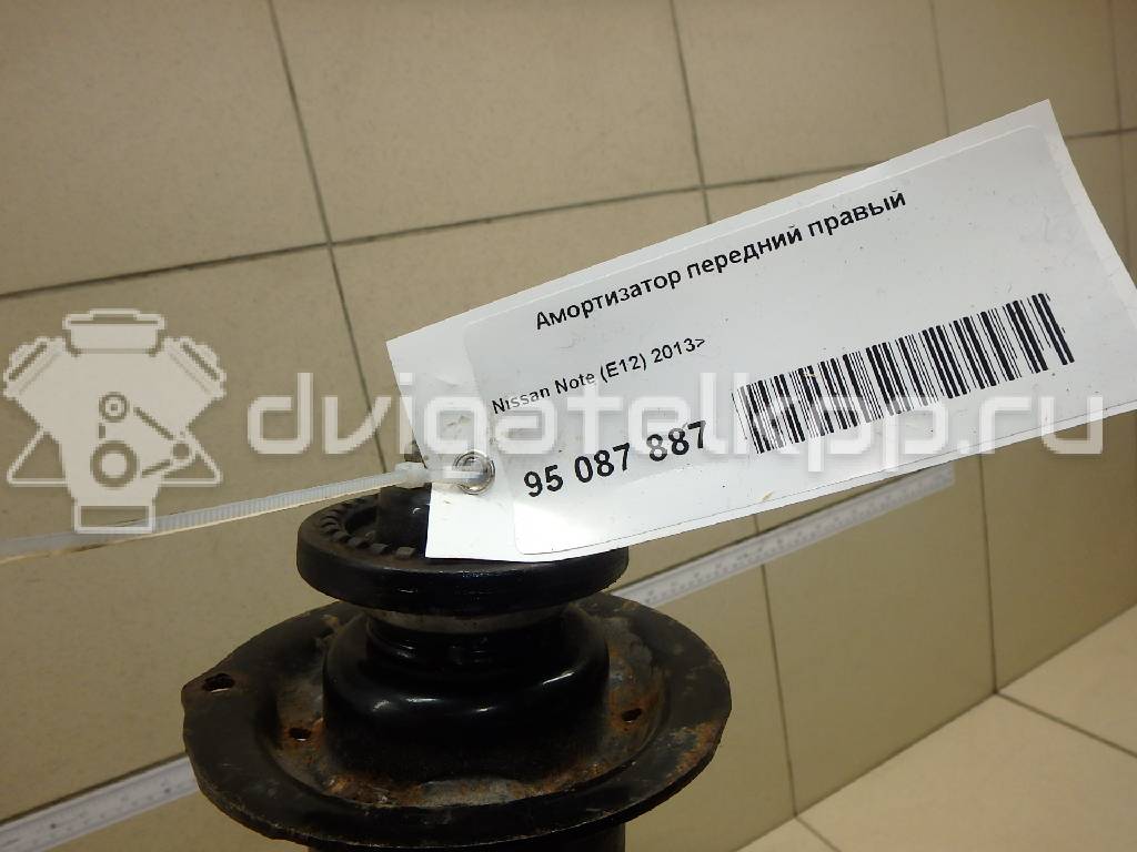 Фото Амортизатор передний правый  e43023vu0b для Nissan Note / Micra {forloop.counter}}