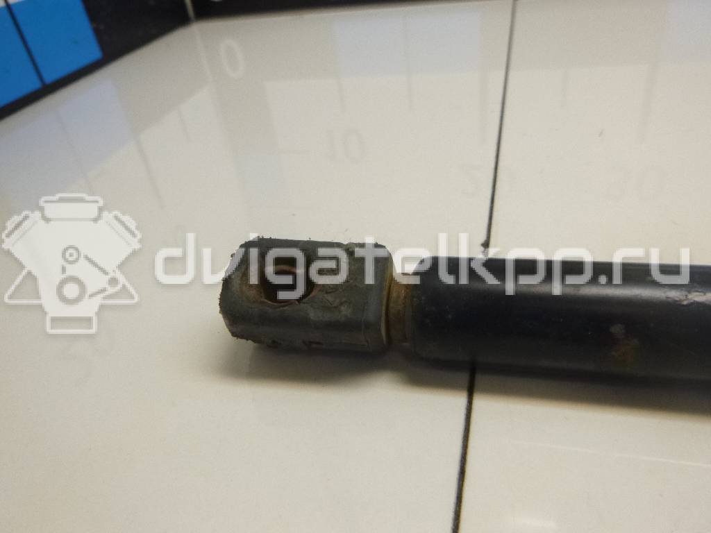 Фото Амортизатор двери багажника  904509U00C для Nissan Note {forloop.counter}}