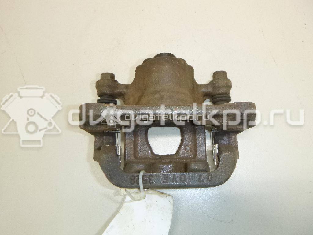 Фото Суппорт тормозной задний правый  44001EM11A для Nissan Tiida / Qashqai / Cube Z12 / Juke F15 / Pulsar C13 {forloop.counter}}