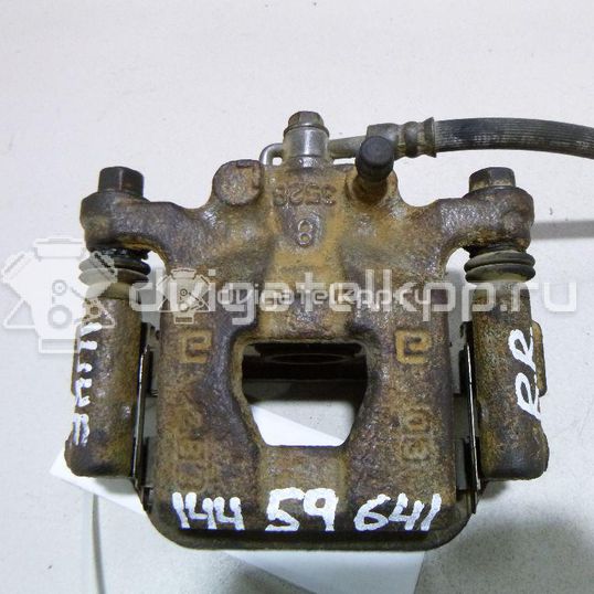 Фото Суппорт тормозной задний правый  440011KD0A для Nissan Tiida / Qashqai / Cube Z12 / Juke F15 / Pulsar C13