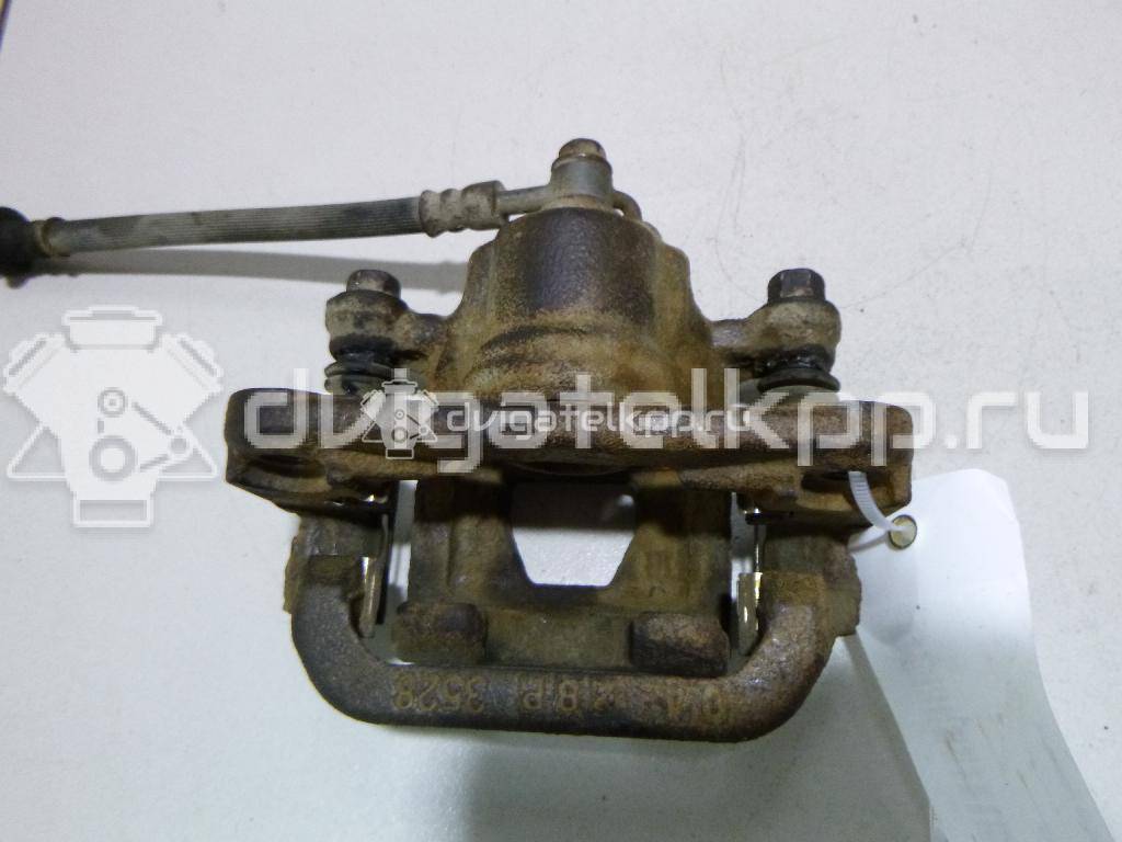 Фото Суппорт тормозной задний правый  440011KD0A для Nissan Tiida / Qashqai / Cube Z12 / Juke F15 / Pulsar C13 {forloop.counter}}