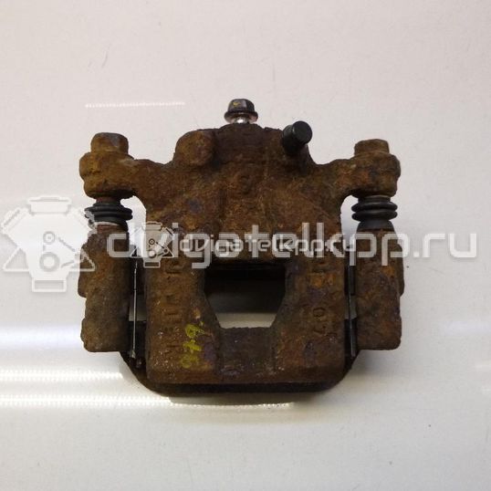 Фото Суппорт тормозной задний правый  440011KD0A для Nissan Tiida / Qashqai / Cube Z12 / Juke F15 / Pulsar C13
