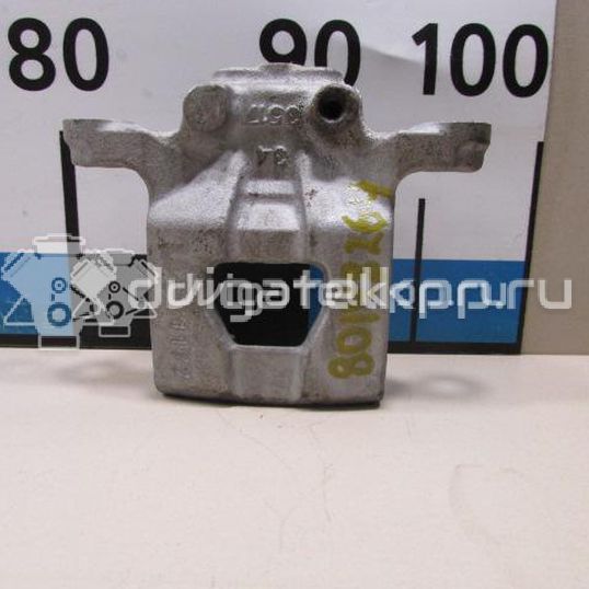 Фото Суппорт тормозной задний правый  44001EM11A для Nissan Tiida / Qashqai / Cube Z12 / Juke F15 / Pulsar C13