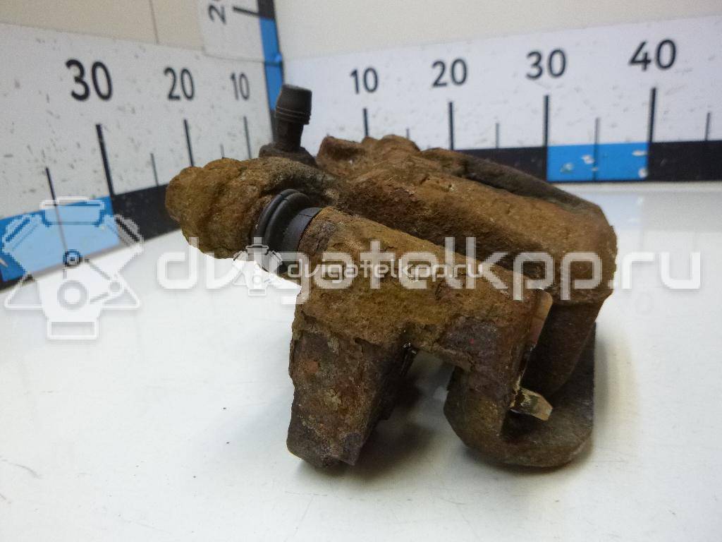 Фото Суппорт тормозной задний левый  440111KD0A для Nissan Tiida / Qashqai / Cube Z12 / Juke F15 / Pulsar C13 {forloop.counter}}