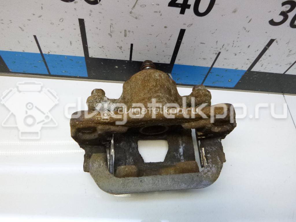 Фото Суппорт тормозной задний левый  440111KD0A для Nissan Tiida / Qashqai / Cube Z12 / Juke F15 / Pulsar C13 {forloop.counter}}