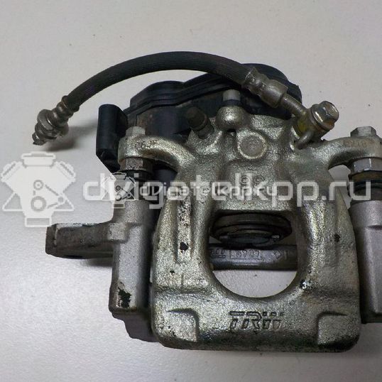 Фото Суппорт тормозной задний левый  440114EA0A для Nissan Qashqai