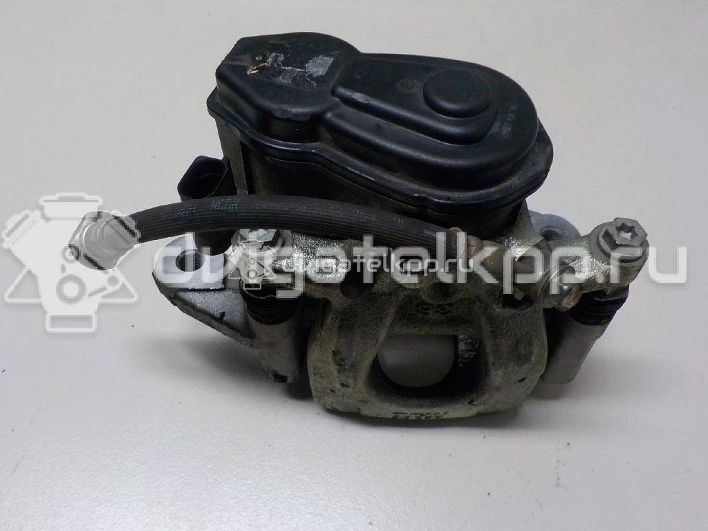 Фото Суппорт тормозной задний левый  440114EA0A для Nissan Qashqai {forloop.counter}}