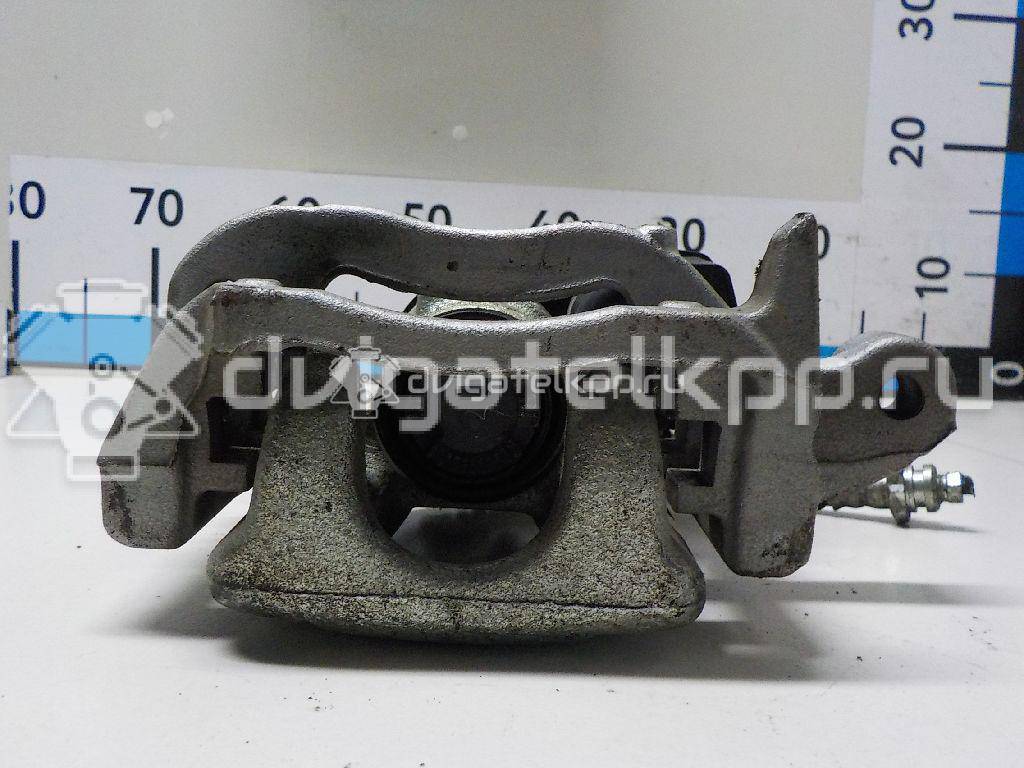 Фото Суппорт тормозной задний левый  440114EA0A для Nissan Qashqai {forloop.counter}}