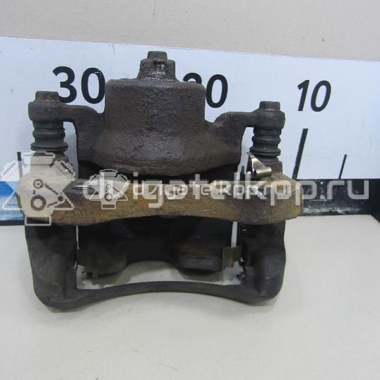 Фото Суппорт тормозной передний правый  41001EM10A для Nissan Tiida / Cube Z12