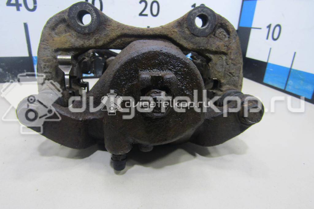Фото Суппорт тормозной передний правый  41001EM10A для Nissan Tiida / Cube Z12 {forloop.counter}}