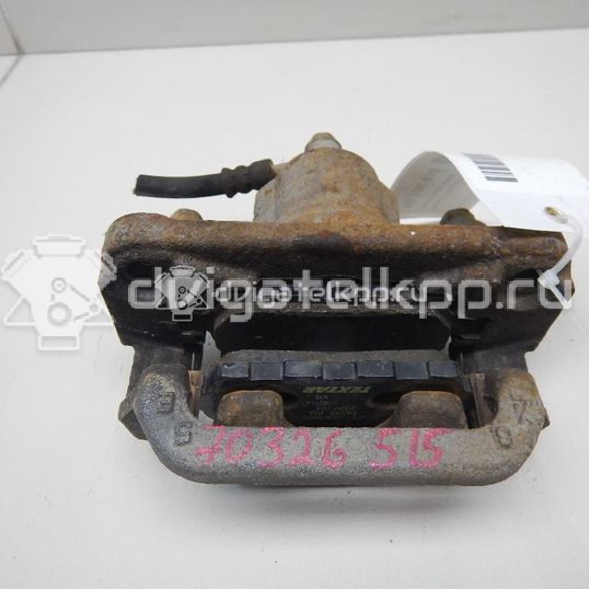 Фото Суппорт тормозной задний правый  44001JG00A для Nissan X-Trail