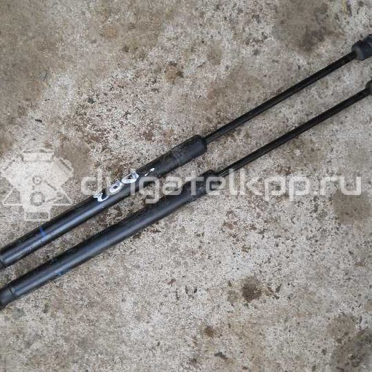 Фото Амортизатор двери багажника  24463829 для Opel Astra / Zafira