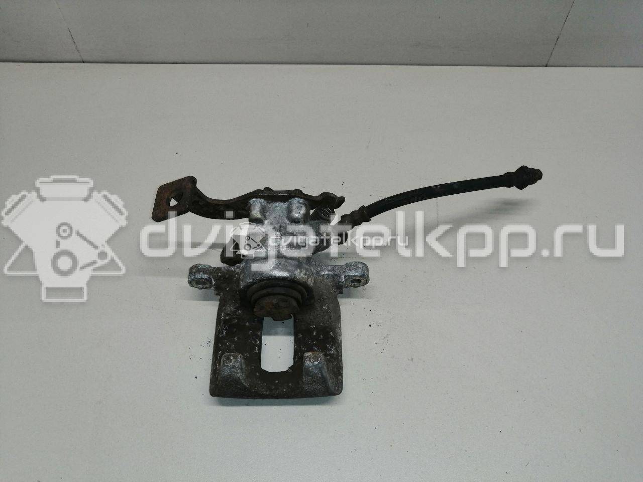 Фото Суппорт тормозной задний левый  4785002100 для Toyota Corolla / Auris {forloop.counter}}