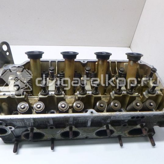 Фото Головка блока для двигателя 4G93 (DOHC 16V) для Mitsubishi Colt / Lancer / Carisma Da / Space 112-156 л.с 16V 1.8 л бензин MD311426