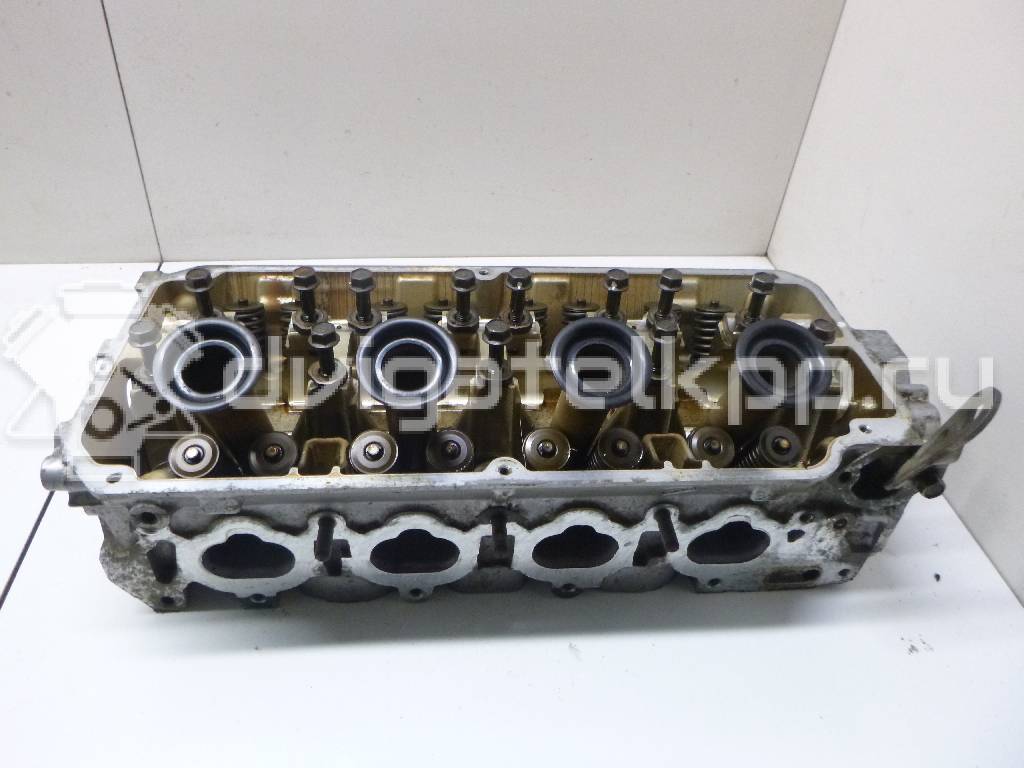 Фото Головка блока для двигателя 4G93 (DOHC 16V) для Mitsubishi Colt / Lancer / Carisma Da / Space 112-156 л.с 16V 1.8 л бензин MD311426 {forloop.counter}}