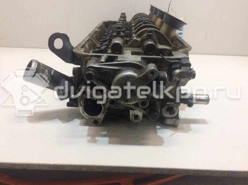 Фото Головка блока для двигателя 4G92 (DOHC 16V) для Mitsubishi Mirage 147-174 л.с 16V 1.6 л бензин {forloop.counter}}