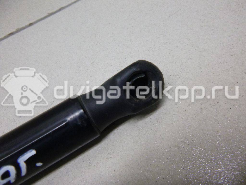 Фото Амортизатор двери багажника  8M51A406A10AB для Ford Focus / Sierra {forloop.counter}}