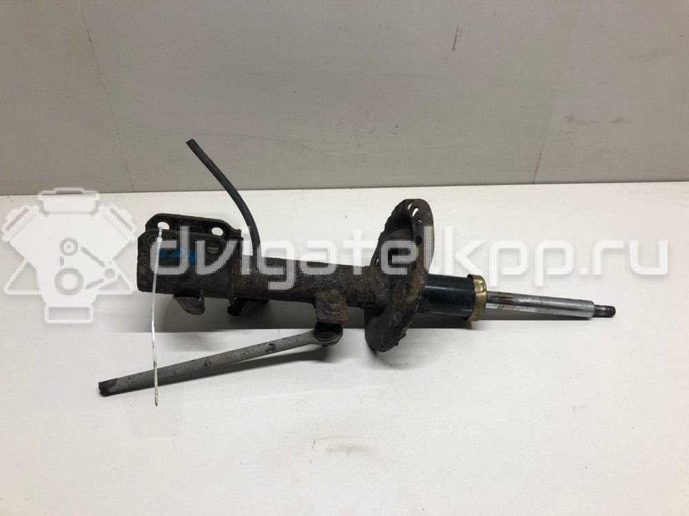 Фото Амортизатор передний левый  543039u025 для Nissan Note / Micra {forloop.counter}}