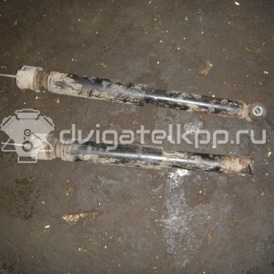 Фото Амортизатор задний  562009U000 для Nissan Note / Micra