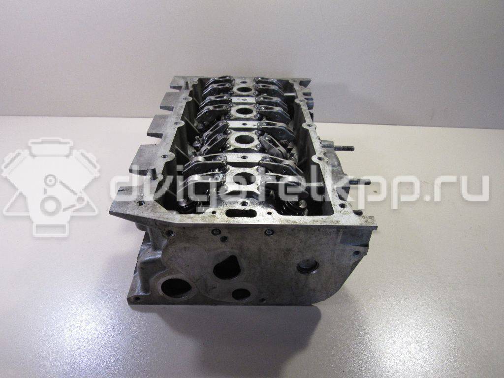 Фото Головка блока для двигателя CVNA для Audi A5 / A4 150 л.с 16V 1.4 л бензин 04E103065S {forloop.counter}}