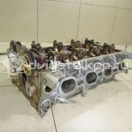 Фото Головка блока для двигателя 1NZ-FE для Subaru / Mitsuoka / Toyota 103-109 л.с 16V 1.5 л бензин 1110121031