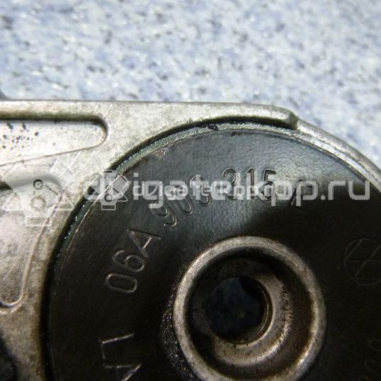 Фото Ролик руч.ремня с кронштейном  06a903315f для Seat Ibiza / Cordoba / Leon / Toledo / Alhambra