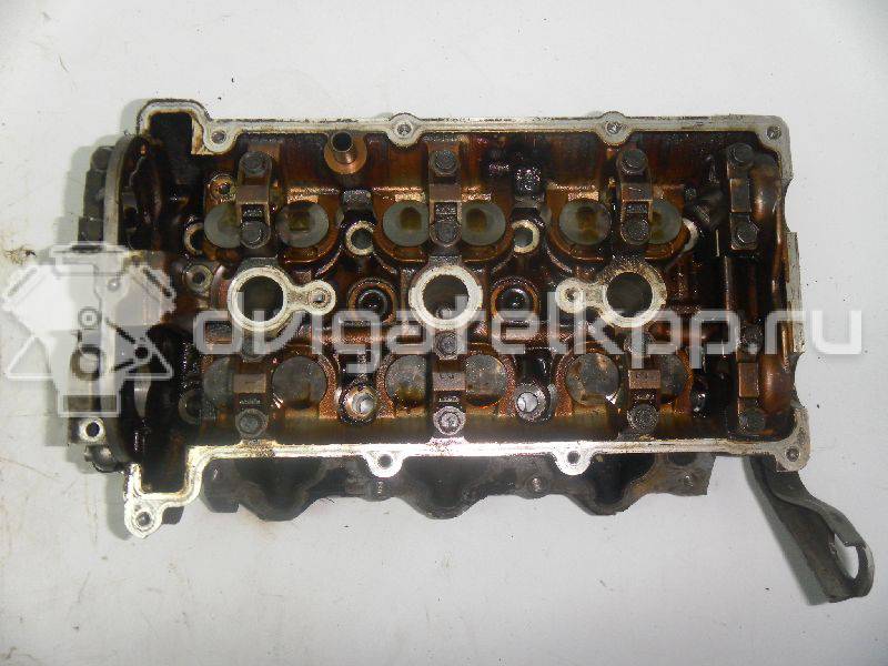 Фото Головка блока для двигателя KL для Mazda Mx-6 / Mx-6 Ge / 626 162-163 л.с 24V 2.5 л нормальный бензин (91) неэтилированный {forloop.counter}}