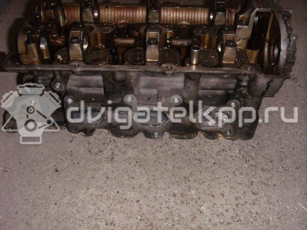 Фото Головка блока для двигателя KL для Mazda Xedos / Mx-6 / Mx-6 Ge / 626 163-167 л.с 24V 2.5 л бензин {forloop.counter}}