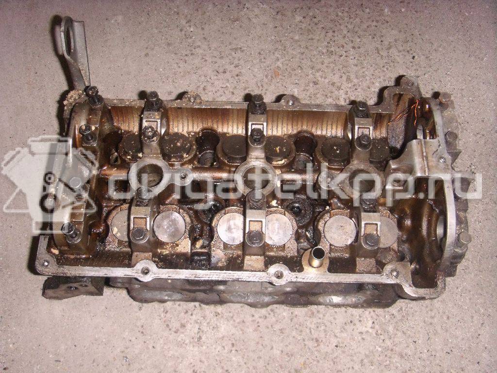 Фото Головка блока для двигателя B6 (DOHC) для Mazda Xedos / 323 107-109 л.с 16V 1.6 л бензин {forloop.counter}}