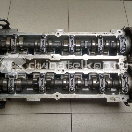 Фото Головка блока для двигателя BP (DOHC) для Mazda / Ford Australia / Eunos 103-125 л.с 16V 1.8 л бензин