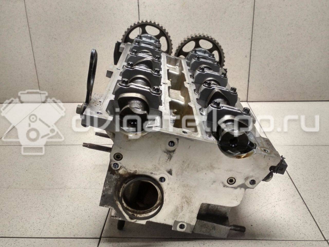 Фото Головка блока для двигателя BP (DOHC) для Mazda / Ford Australia / Eunos 103-125 л.с 16V 1.8 л бензин {forloop.counter}}