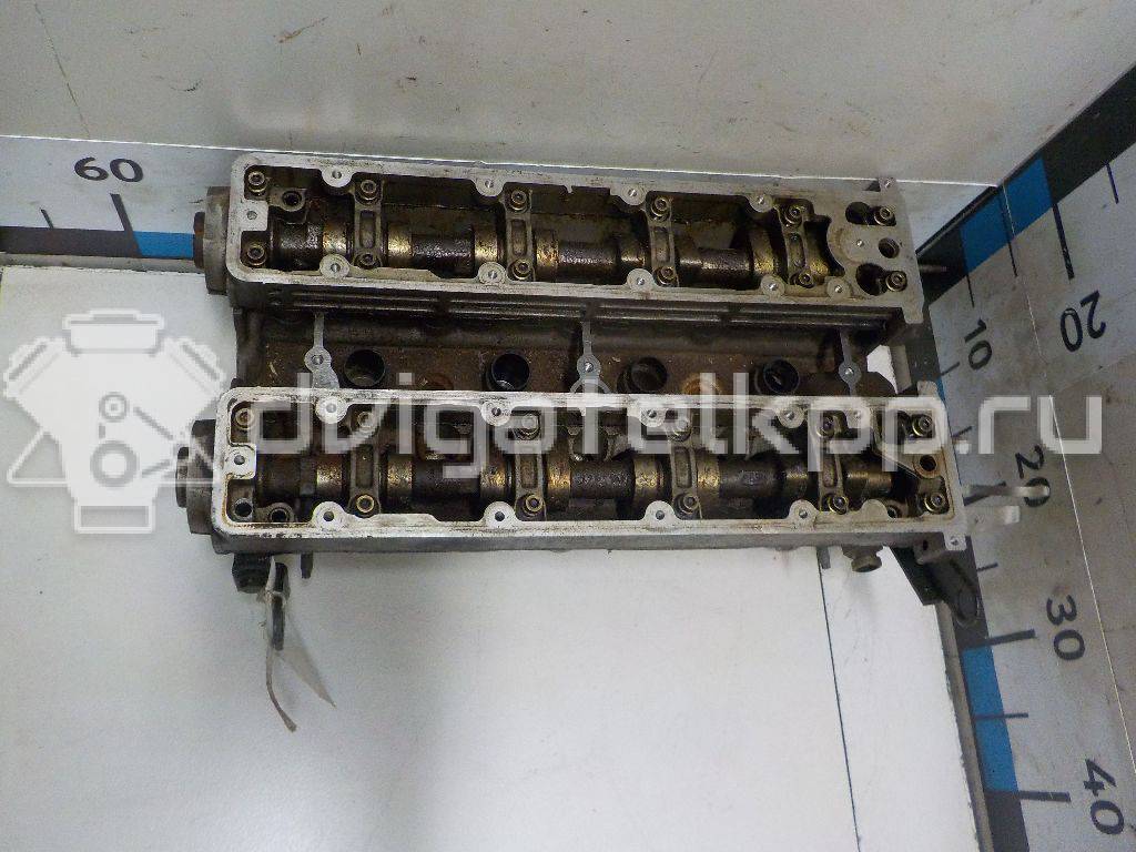 Фото Головка блока для двигателя RFJ (EW10A) для Peugeot / Citroen 140-151 л.с 16V 2.0 л бензин {forloop.counter}}