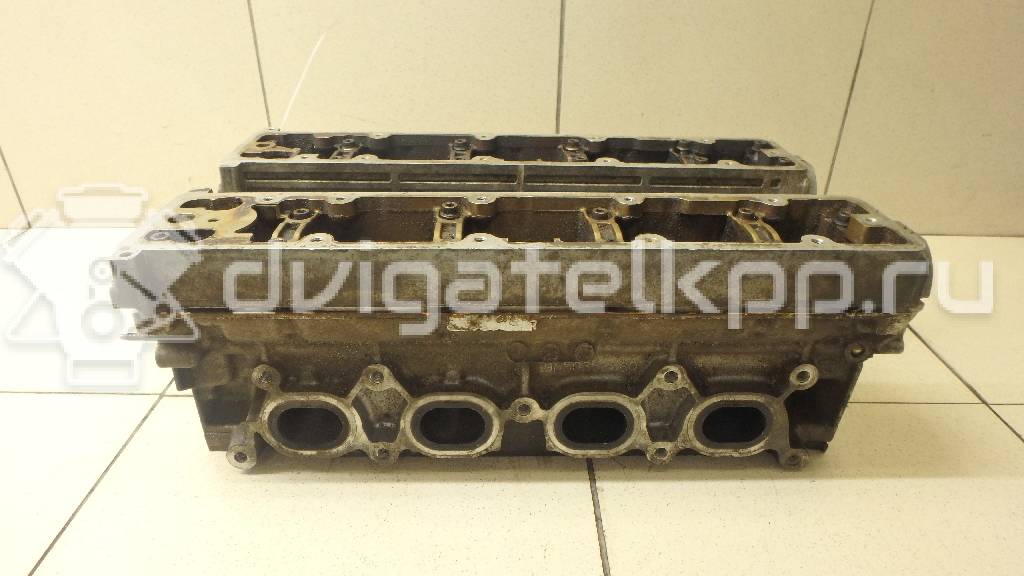 Фото Головка блока для двигателя RFJ (EW10A) для Peugeot / Citroen 140-151 л.с 16V 2.0 л бензин 0200FT {forloop.counter}}