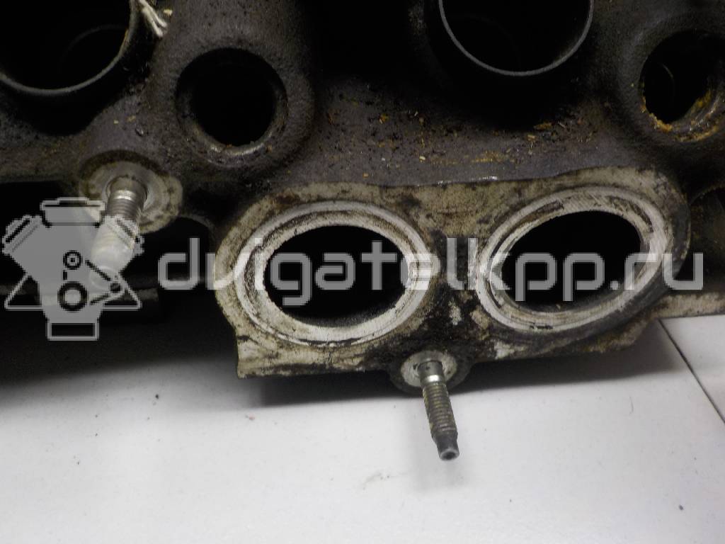 Фото Головка блока для двигателя KFX (TU3JP) для Peugeot / Citroen 67-75 л.с 8V 1.4 л бензин 0200AR {forloop.counter}}