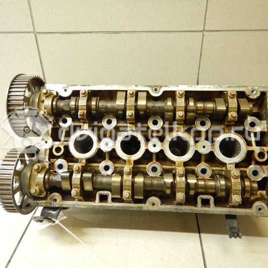 Фото Головка блока для двигателя Z 16 XEP для Opel / Vauxhall 101-105 л.с 16V 1.6 л бензин 24461591